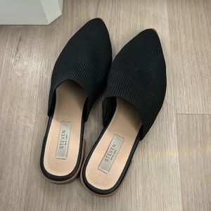 Black pointed toe mule flats